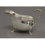 A silver sauce boat. 17.5 cm long. 264.6 grammes.