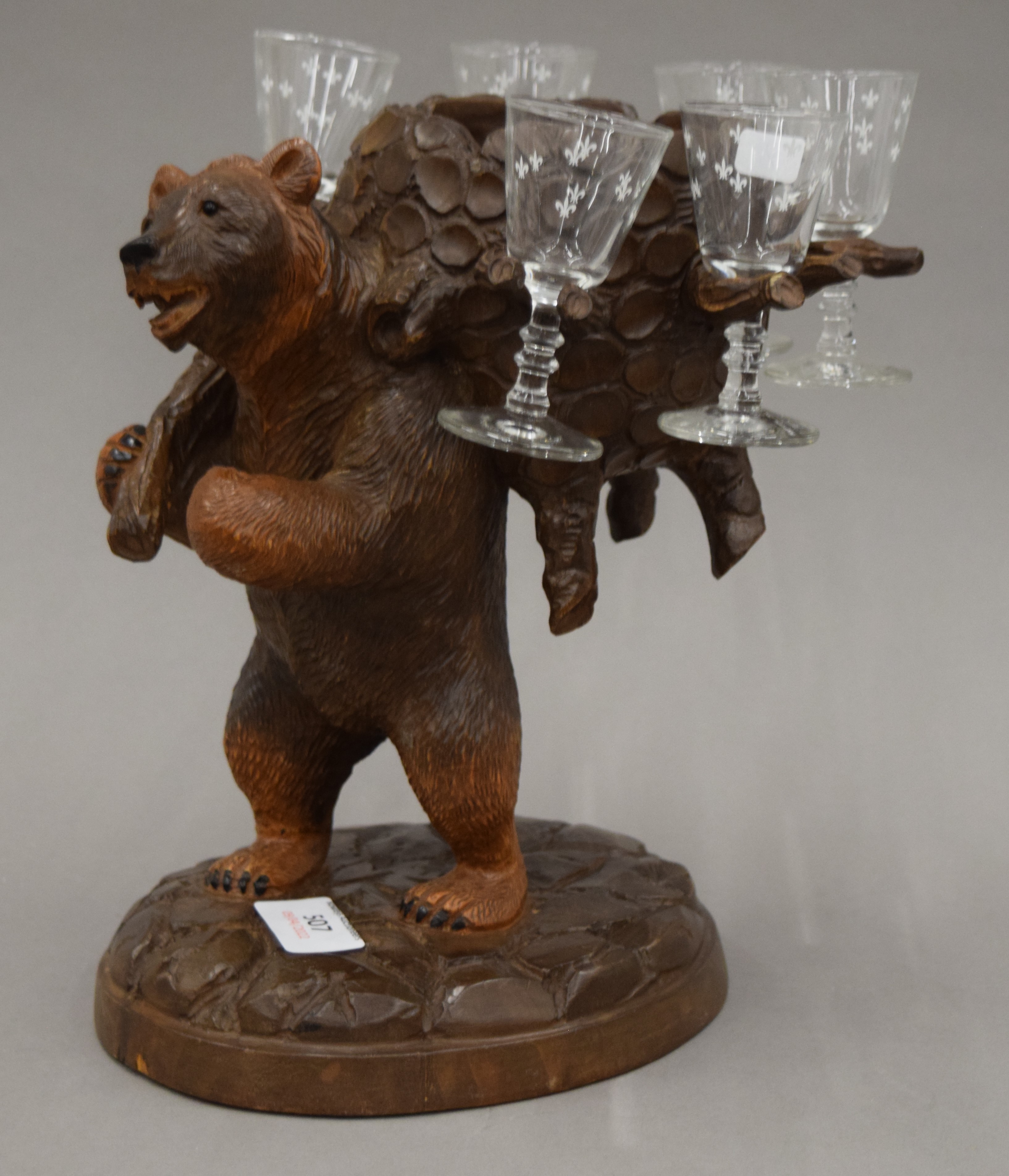 A Blackforest carved wooden liqueur set stand formed as a bear, - Image 9 of 13