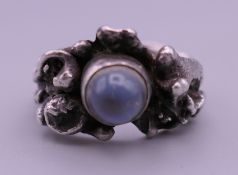 A silver and moonstone ring. Ring size N/O.
