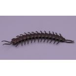 A bronze model of an articulated centipede. 16.5 cm long.