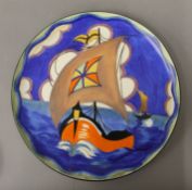 A Carltonware charger decorated with a galleon. 32 cm diameter.