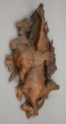 A Blackforest carved wooden wall plaque formed as dead game. 56 cm high.