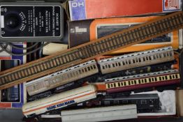 A quantity of various H O gauge carriages and other rolling stock, including Hornby and Lima.