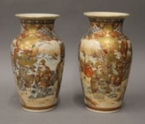 A pair of late 19th century Satsuma vases. 25 cm high.