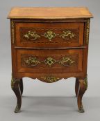 A 19th century Continental gilt brass mounted bombe shape commode. 63 cm wide.