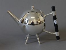 A Christopher Dresser style teapot. 13.5 cm high.