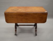 A 19th century mahogany Pembroke table. 102 cm long.