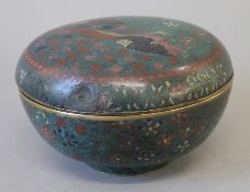 A round cloisonne box and cover. 16.5 cm diameter.