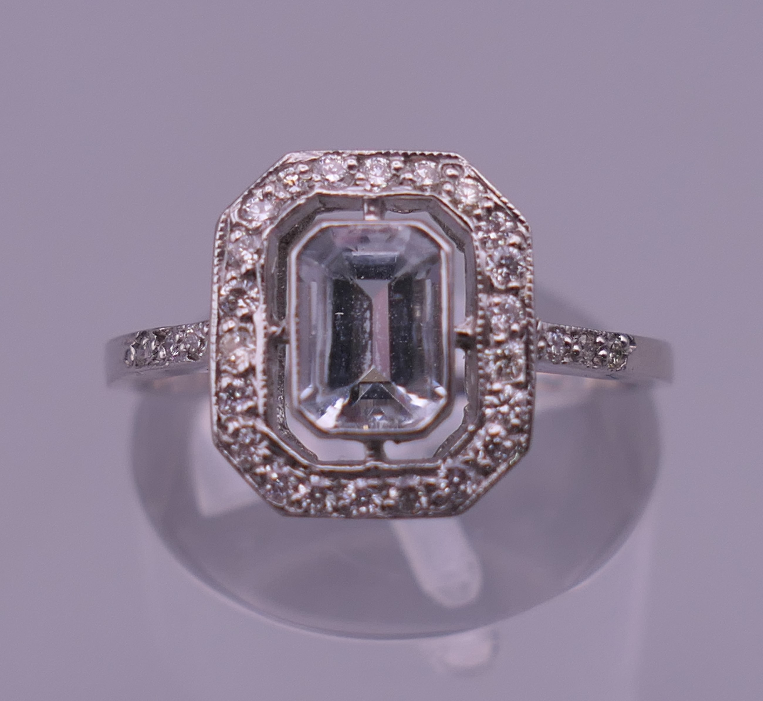 A platinum diamond and aquamarine ring. Ring size M/N. - Image 8 of 8