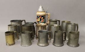 A collection of tankards, etc.