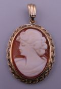 A 9 ct gold cameo pendant. 2.5 cm high excluding suspension loop.