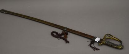 A William IV dress sword in scabbard. 97 cm long.