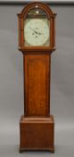 A late 18th/early 19th century oak longcase clock. 203 cm high.