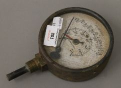 A vintage pressure gauge. 12 cm diameter.
