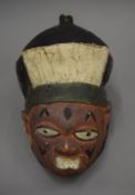 An African Yoruba tribe helmet mask. 37 cm high.
