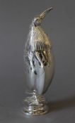 A silver plated sugar sifter formed as a penguin. 18.5 cm high.