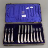 A quantity of silver handled cutlery in a case.