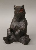 A Blackforest bear form tobacco jar. 21 cm high.