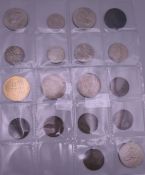 A coin collection, including American dollars.