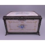 A 19th century French silver and painted ivory casket. 10 cm high, 16 cm wide, 11 cm deep.