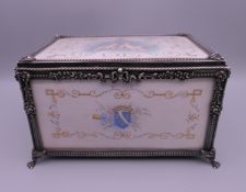 A 19th century French silver and painted ivory casket. 10 cm high, 16 cm wide, 11 cm deep.
