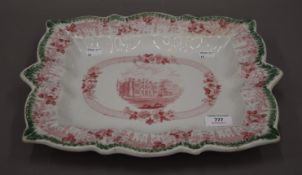 A Masons Ironstone platter decorated with a country house. 38 cm wide.