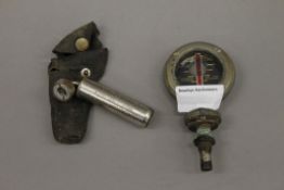 A vintage Boyce Motometer and a Schnader Balloon Tyre Gauge.