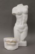 A plaster model of a female torso, together with a plaster model of lips. The former 52 cm high.