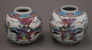 A near pair of 19th century Chinese porcelain hand painted ovoid vases,