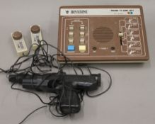 A vintage Binatone games console with gun.