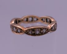 A 9 ct gold eternity ring. Ring size L. 2.6 grammes total weight.
