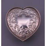 A heart shaped silver box. 5 cm wide. 38 grammes.