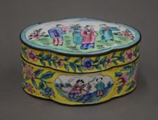 A Canton enamelled box and cover. 10 cm wide.