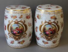 A pair of romantic scene porcelain barrel stools. 45 cm high.