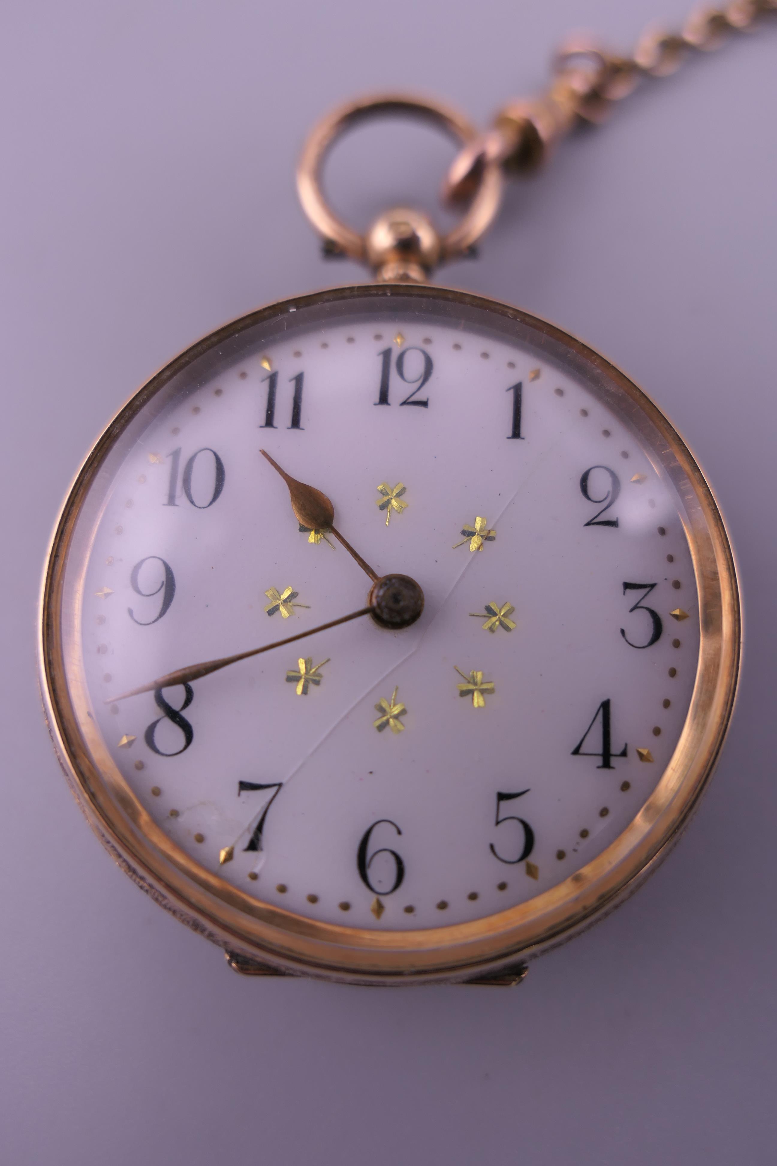 A ladies 14 K gold pocket watch (33 grammes total weight) on a 9 ct gold chain (7 grammes). Watch 3. - Image 2 of 13