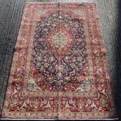 A Kashan rug. 250 x 145 cm.