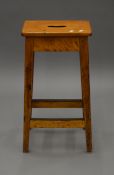 A vintage laboratory stool. 67 cm high.