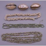South Seas Island shell necklaces and three shell purses. Purses approximately 6.5 cm long.