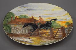 A Dick Turpin pottery wall charger. 40 cm diameter.