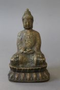 A small bronze model of buddha. 15 cm high.