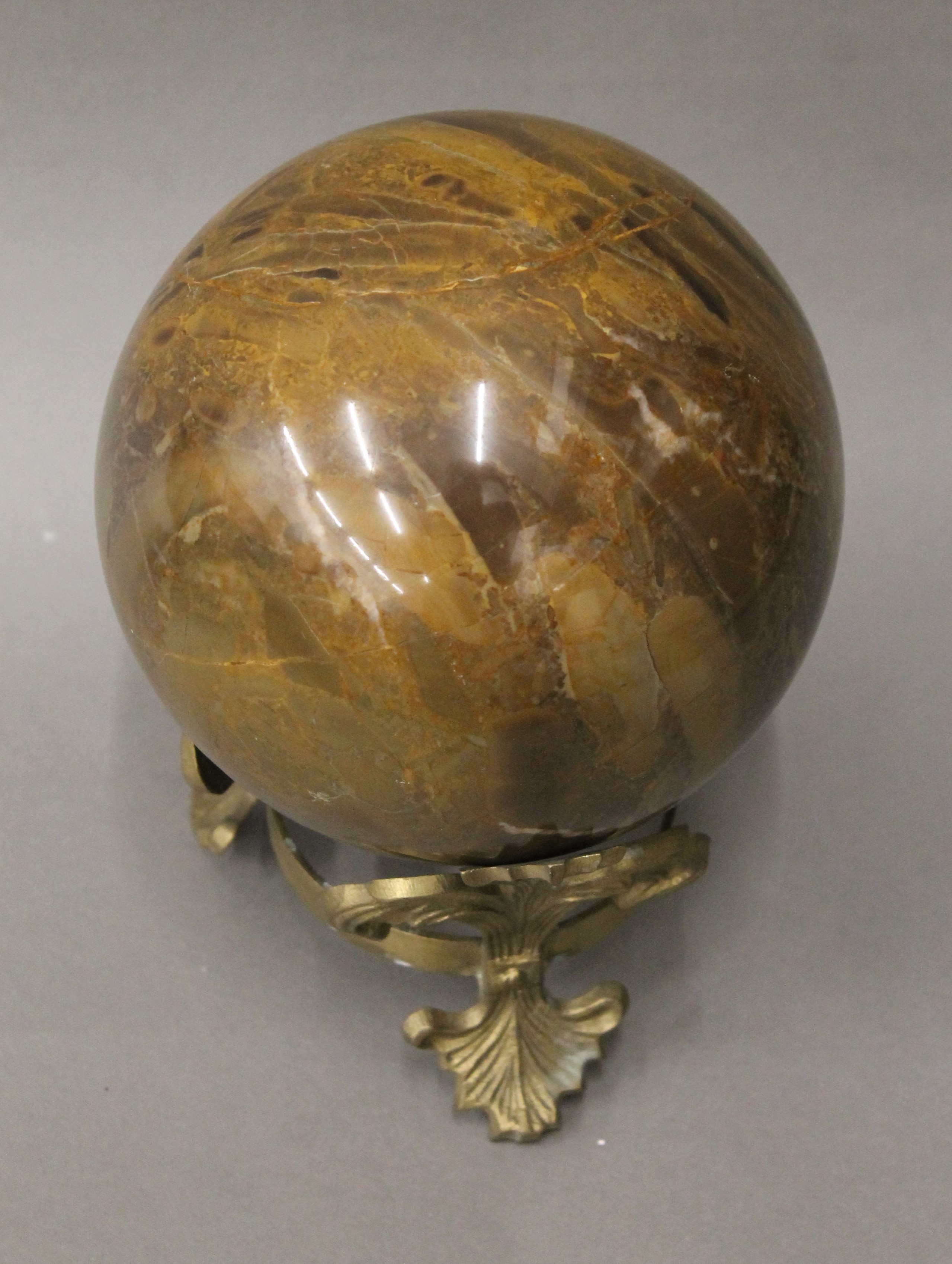 A large marble ball on a brass stand. 20 cm high overall. - Image 3 of 4