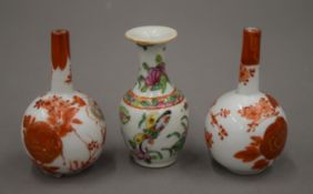A small pair of 19th century Kutani porcelain bottle vases and a small 19th century Canton vase.