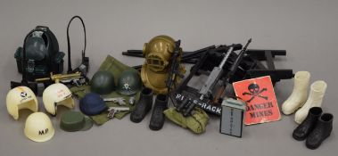 A quantity of vintage Action Man accessories.