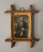 A 19th century tintype photograph of a gentleman, framed and glazed. 11.5 x 15 cm overall.