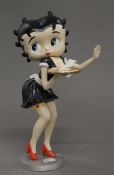 A cast iron model of Betty Boop. 30.5 cm high.