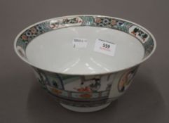 An 18th/19th century Chinese famille verte porcelain bowl. 20.5 cm diameter.
