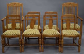 A harlequin set of eight oak dining chairs;