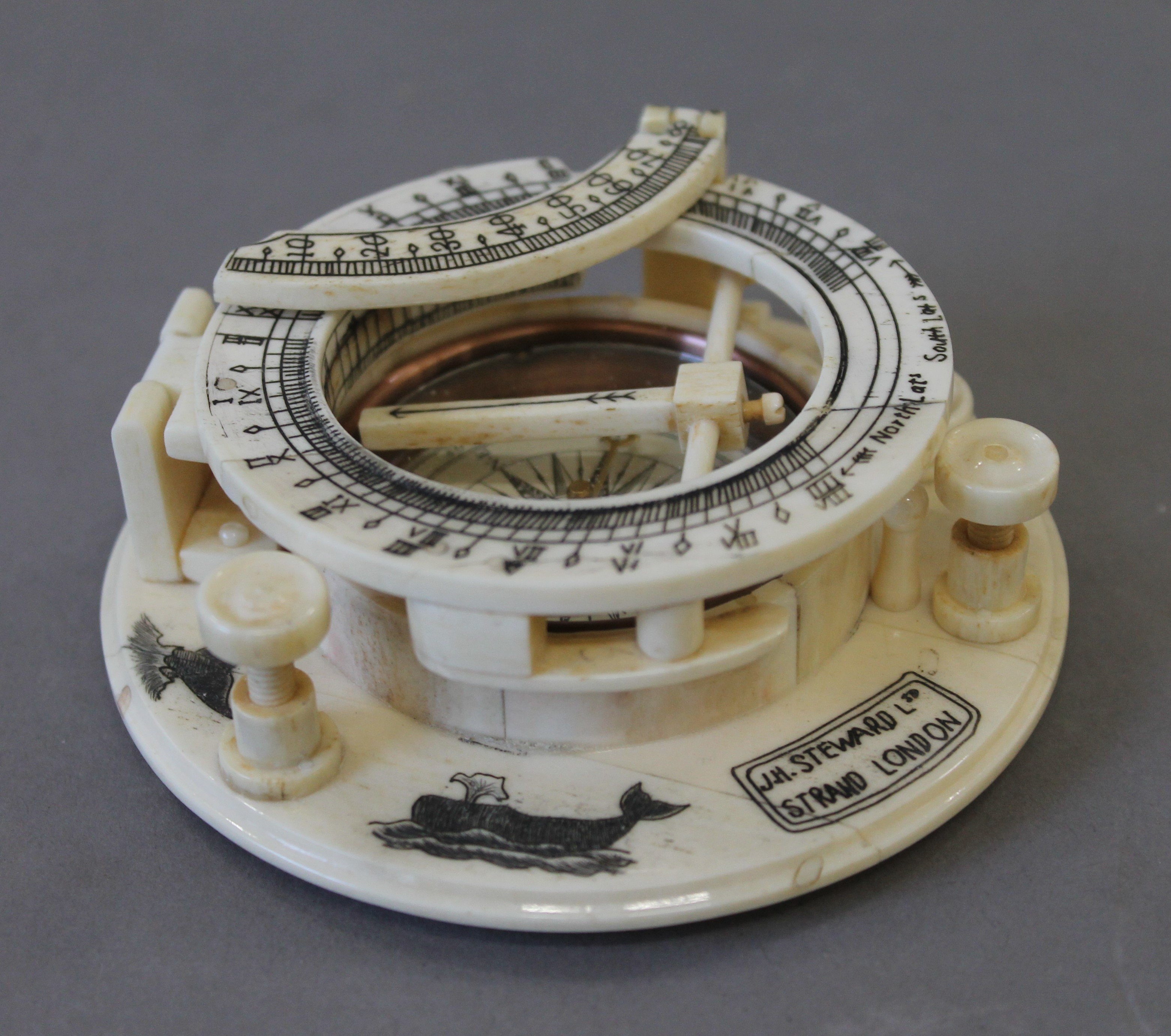 A bone compass. 10.25 cm diameter.