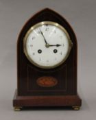 A late 19th/early 20th century inlaid mahogany eight-day mantle clock. 25 cm high.