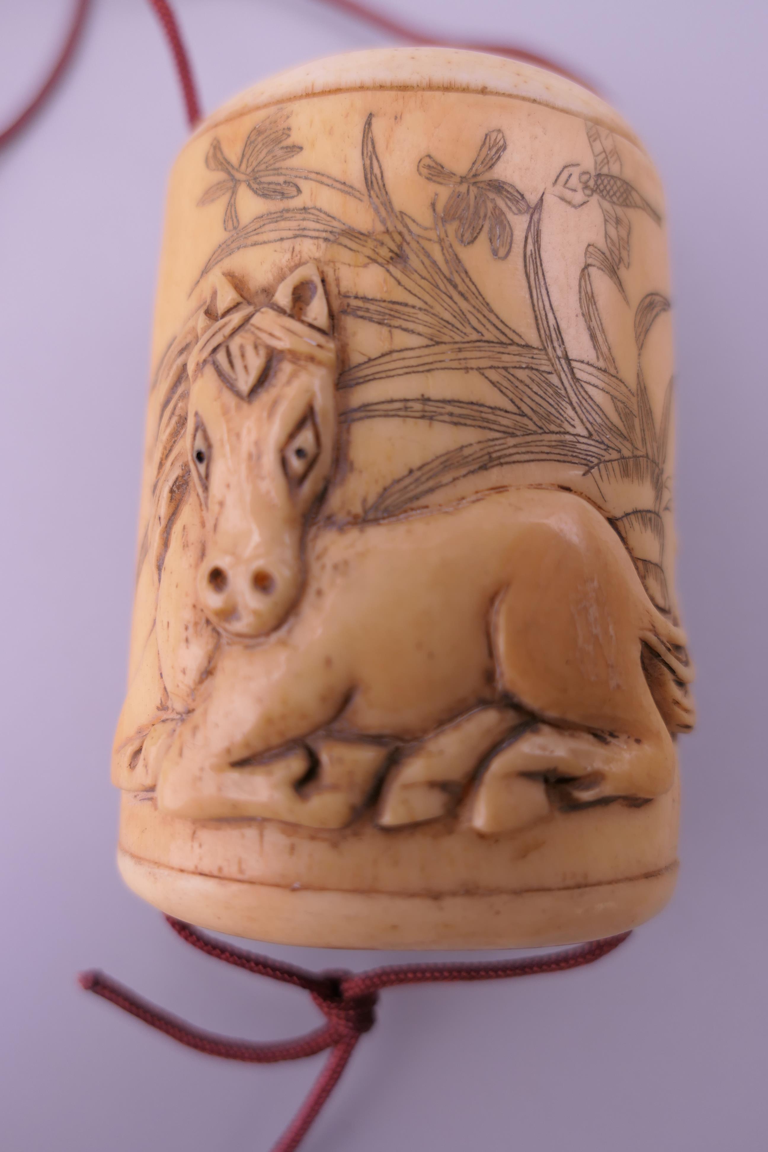 A carved bone inro decorated with horses. 5.5 cm high x 4 cm. - Image 2 of 6